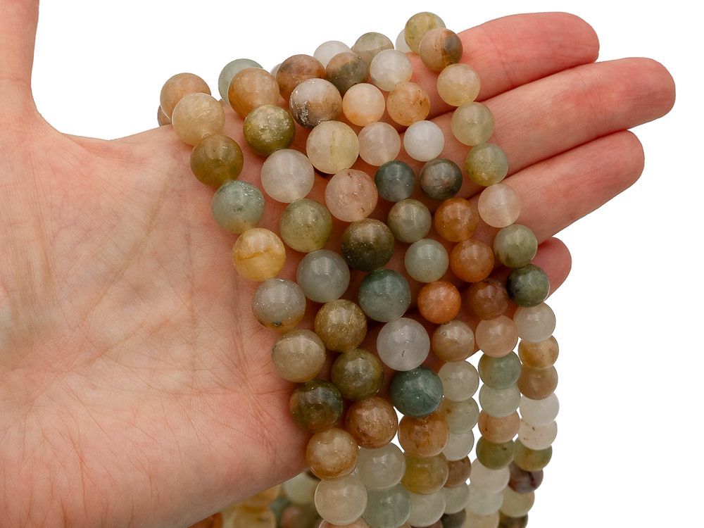 Нить бусин из тонированного кварца 10,5мм