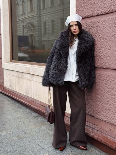 Коричневые женские брюки в полоску