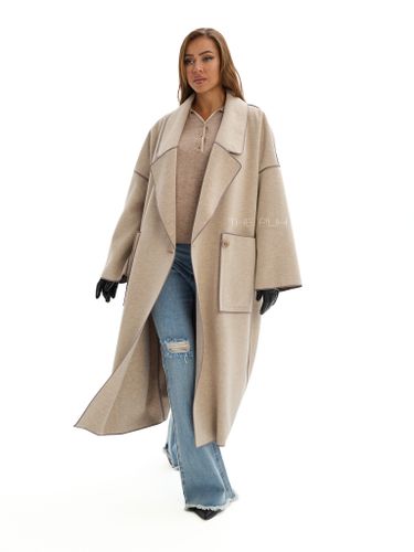Бежевое двубортное пальто без подкладки
