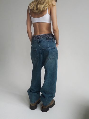 Джинсы с имитацией боксеров