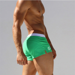 Зеленые мужские плавки-хипсы с белым поясом