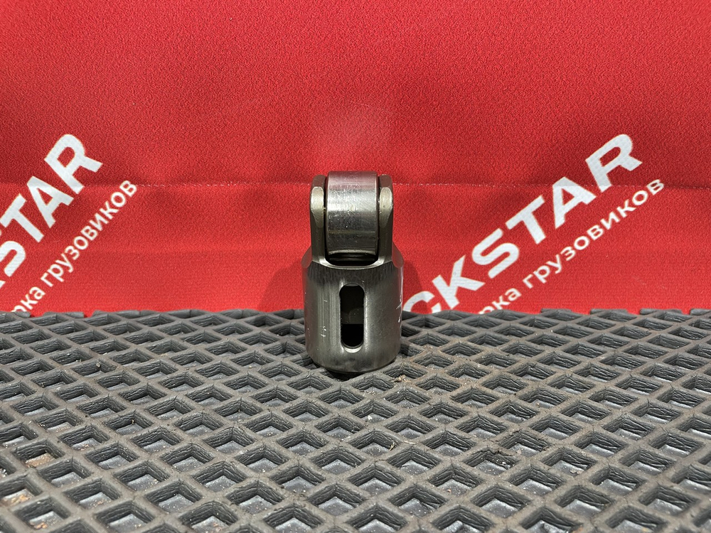 Толкатель выпускного клапана