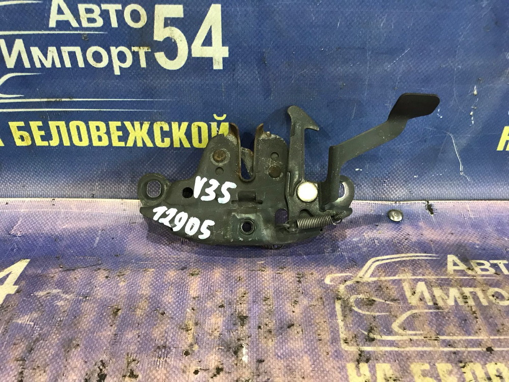 Замок капота NISSAN SKYLINE 2001-2004