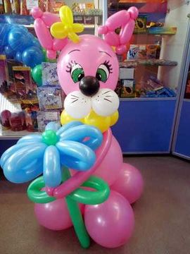 Кошечка с цветком