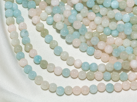 Нить бусин из тонированного кварца 6,7мм, гладкие