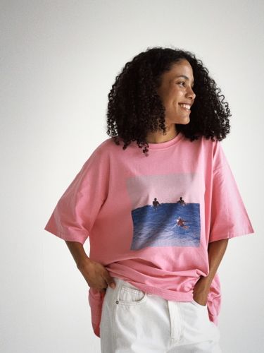 Розовая футболка оверсайз с принтом