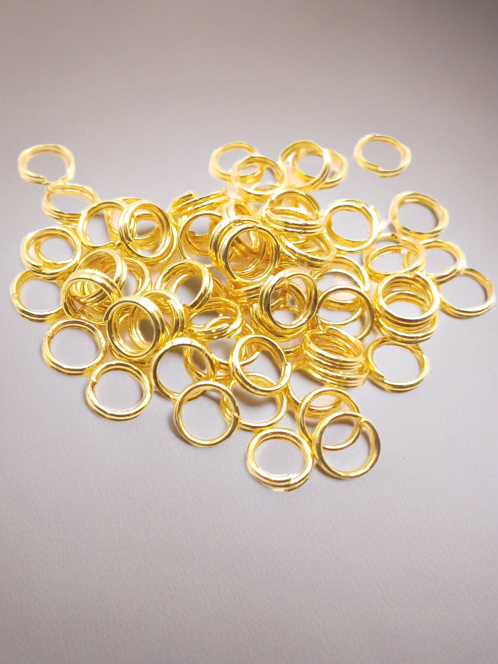 Соединительные кольца для бижутерии двойные. Золотистые. 100 штук