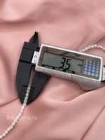 Бусины стеклянные биконусы на нити белые