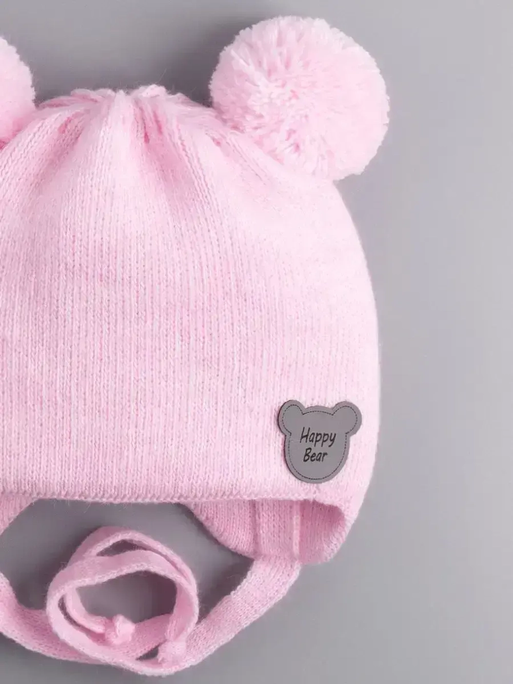 Шапка для девочки осенняя с завязками и помпонами