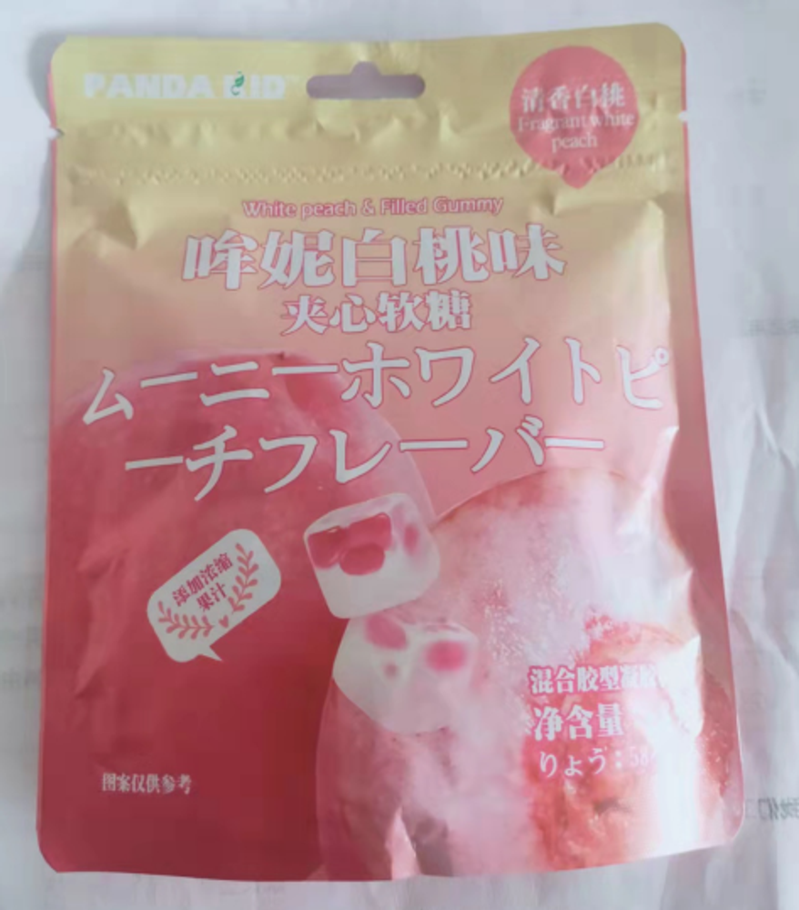 Жевательные конфеты со вкусом персика Hengli Mouni 58г