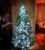 Заснеженная ель с гирляндой «Барокко» холодный свет (Литая+пвх) от 1.2 до 2.4 м