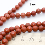 Яшма красная бусины, диаметр 6,4-6,6 мм, цена за 28-29 шт (1/2 нити)