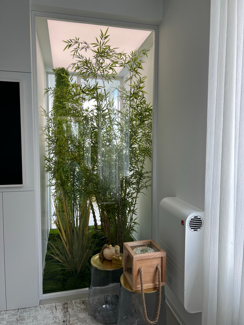 Озеленение искусственными растениями частного интерьера