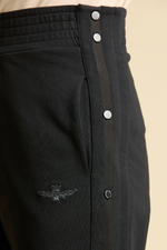 Брюки с боковыми пуговицами