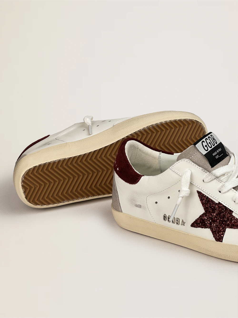 Super Star with burgundy glitter star and burgundy heel tab