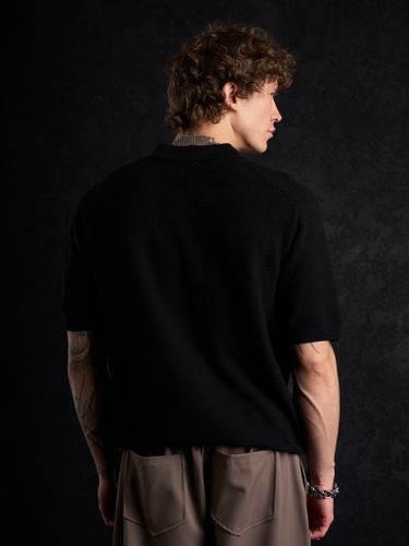 Черная трикотажная футболка-поло Laine New