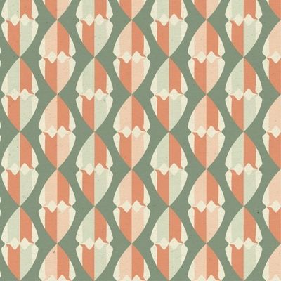 Ткань с рисунком зеленого и оранжевого цвета.