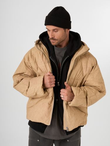 Бежевый объемный пуховик QWE