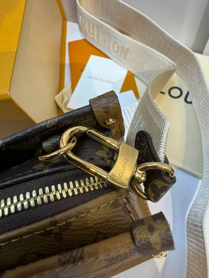 Женская сумка-тоут Louis Vuitton On The Go East West из двух видов канвы Monogram