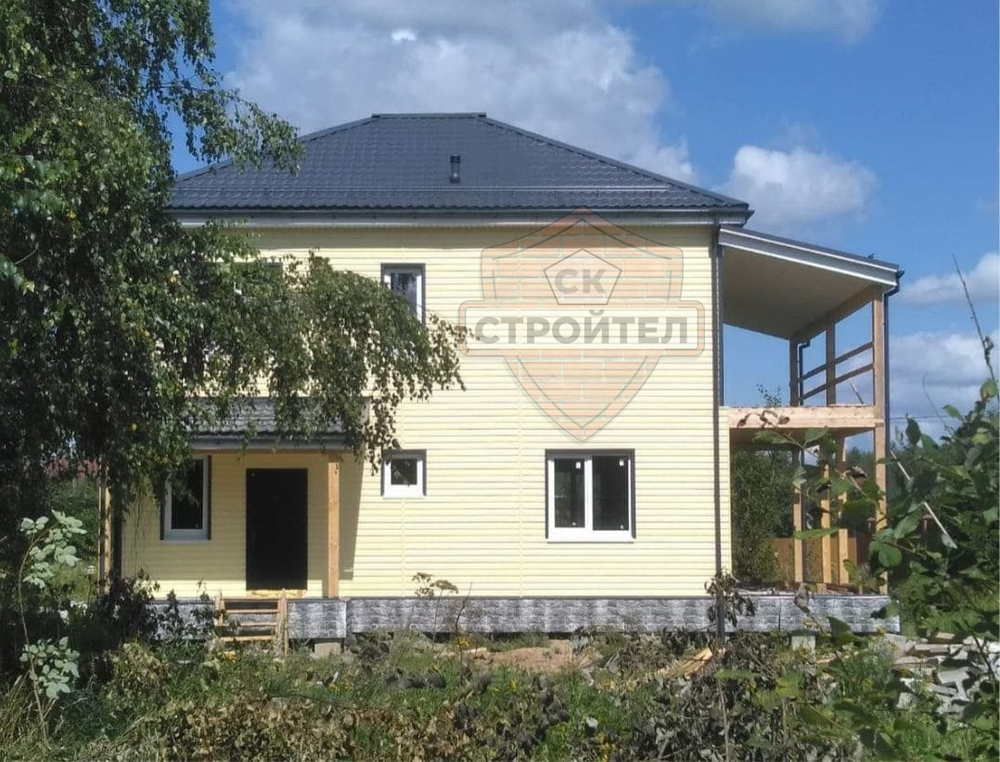 Строительство двухэтажного дома из блоков 210 м2