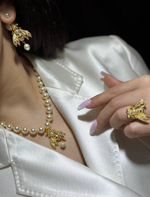 Бусы Dior