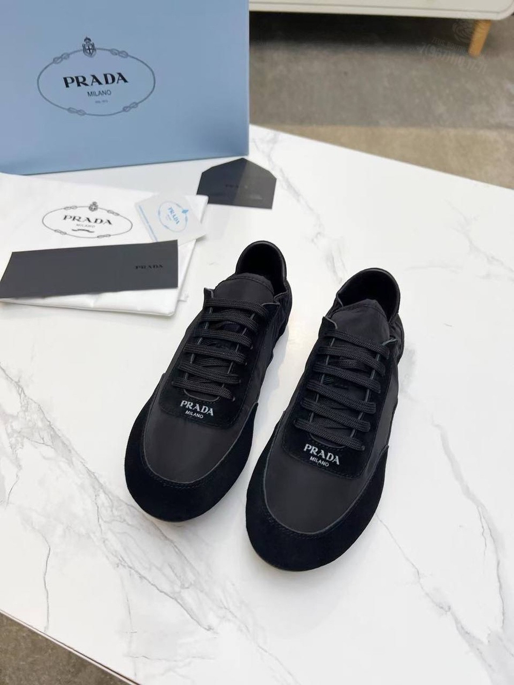 Кроссовки Prada