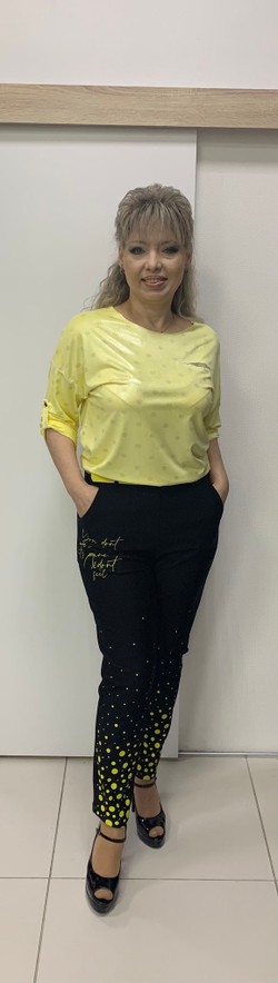 Черные с желтыми горошинами и надписью брюки-штанишки