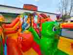 Коммерческий надувной батут «Весёлые динозаврики» с горкой, 5*4*2,8 м