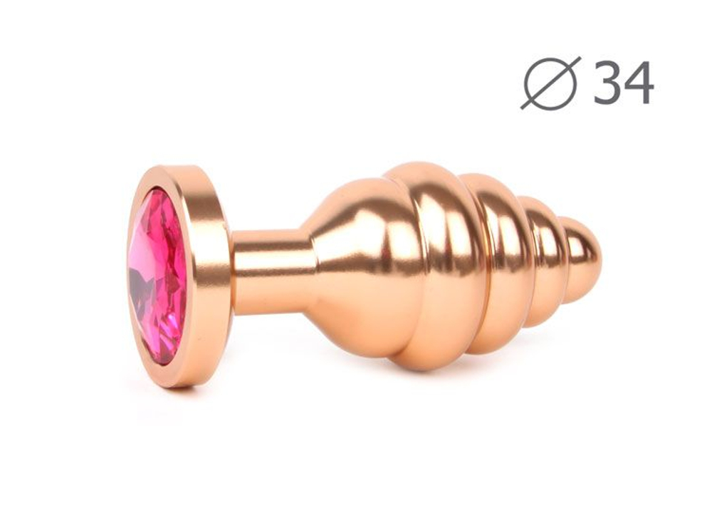 Коническая ребристая золотистая анальная втулка с малиновым кристаллом - 8 см. (Цвет: малиновый)