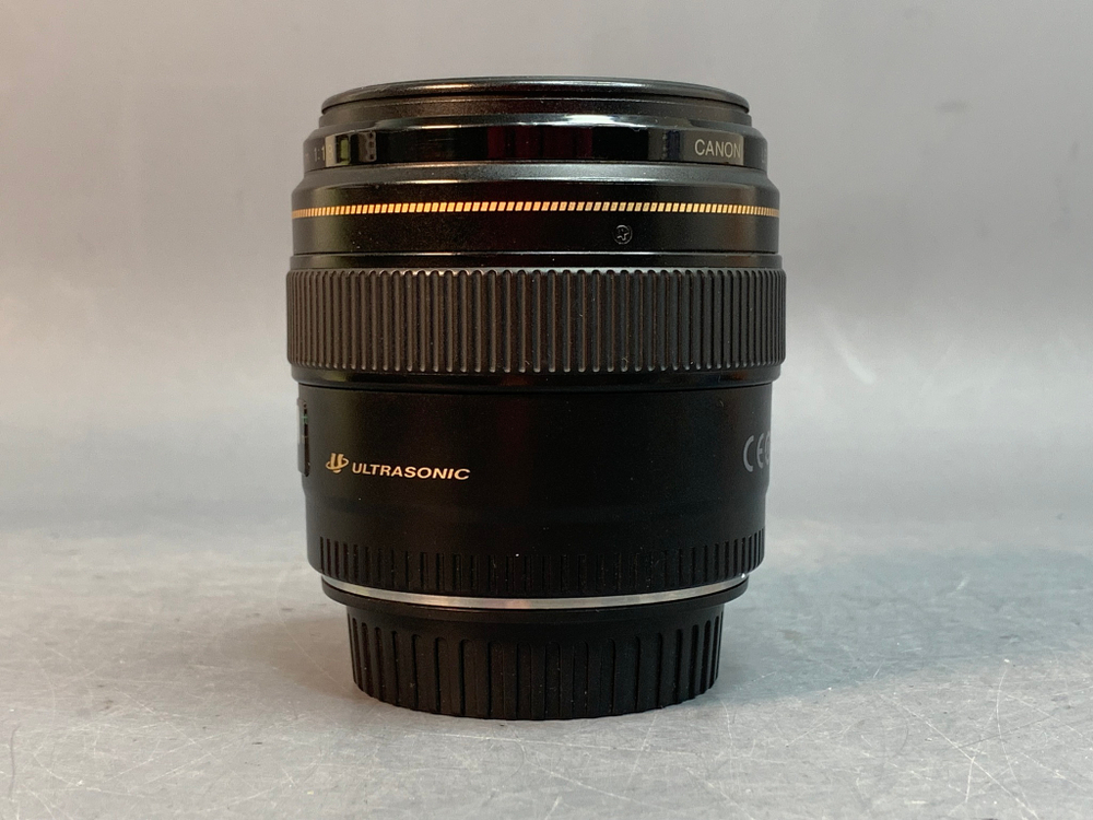 Canon EF 85mm 1.8 USM царапины на передней линзе