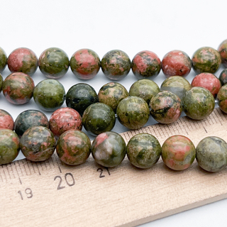 Унакит бусины, диаметр 8,6-8,8 мм, цена за 21-22 шт (1/2 нити)