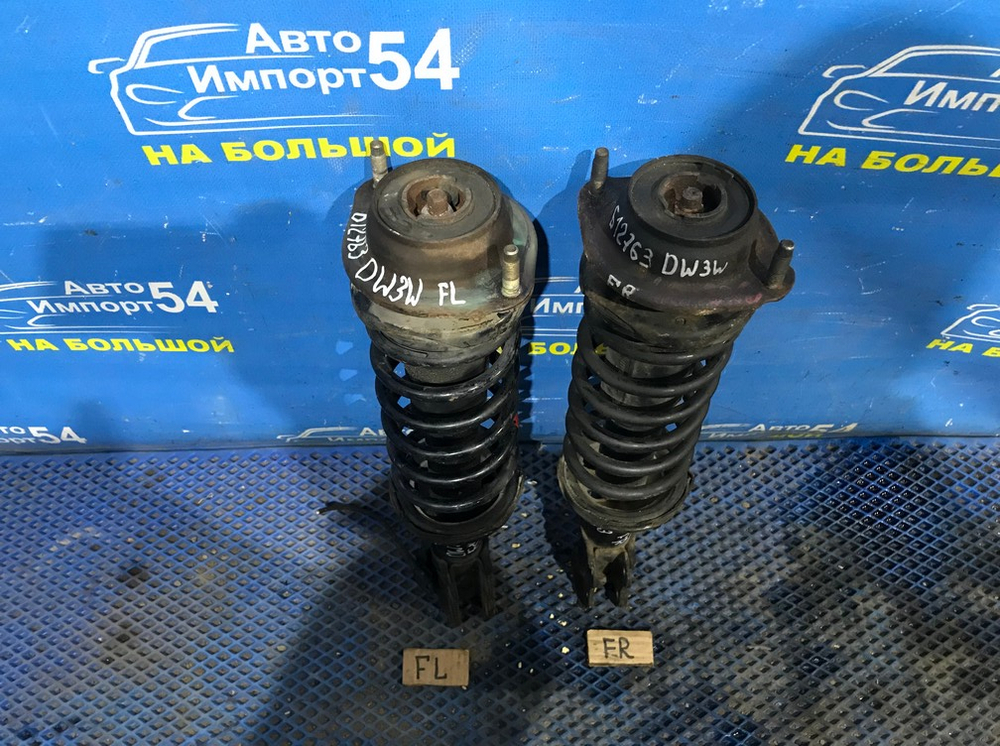 Стойка передняя левая MAZDA DEMIO 1996-2002