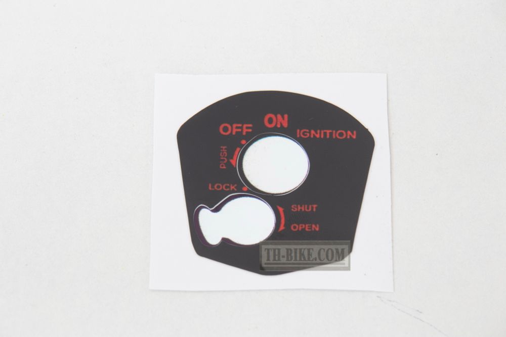 Sticker on ignition switch. Zoomer-X