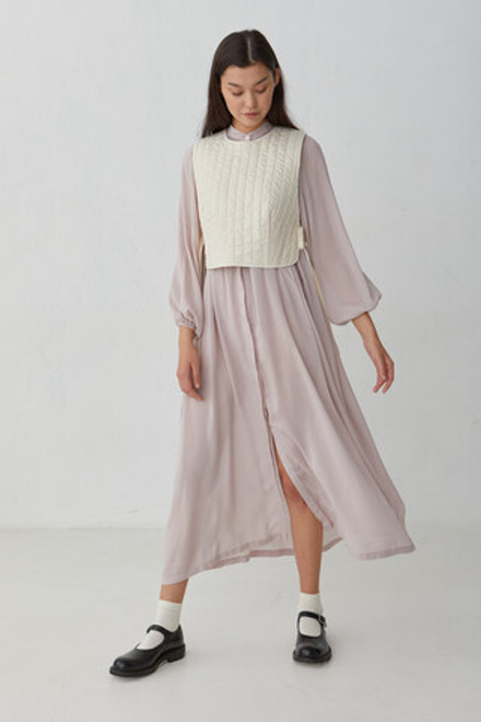 Жилет стеганый молочный