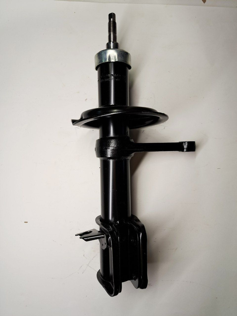 Стойка амортизатора передняя правая 1119-2905402 Птимаш