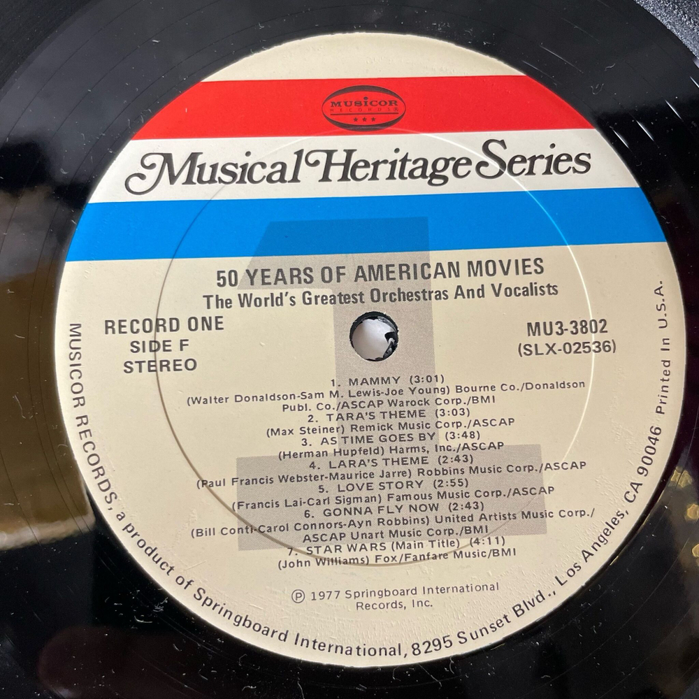 Винтажная виниловая пластинка LP Сборник Музыка Из Американских Фильмов 50 Years Of American Movies (USA 1977) (Star Wars, Gonna Fly Now, Moon River)
