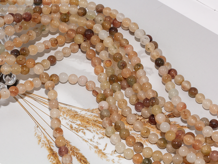 Нить бусин из тонированного кварца 6,5мм