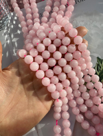 Нить бусин из розового кварца 10,4мм, гладкие