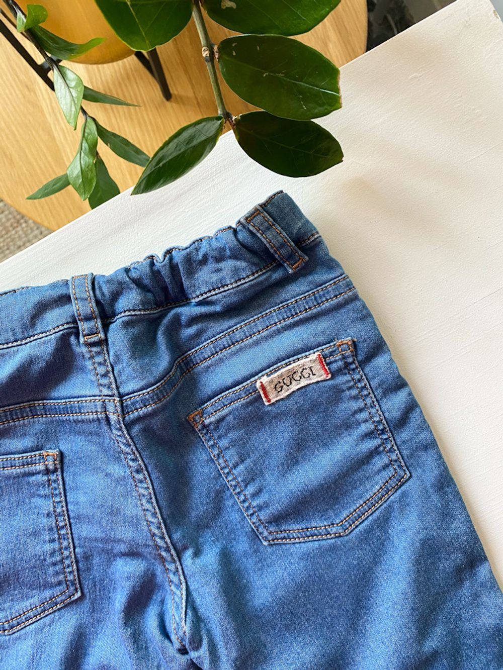 Джинсы Gucci, 92