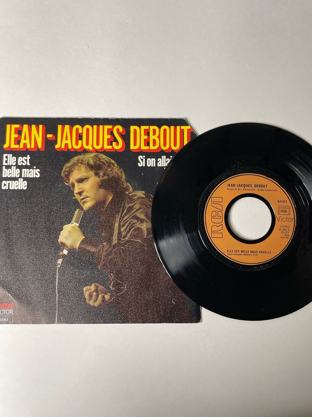 Винтажная виниловая пластинка LP Jean Jacques Debout Elle Est Belle Mais Cruelle / Si On Allait Tous Les Deux Au Cinema (France 1975) 7 дюймов