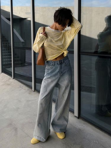 Светло-голубые широкие джинсы женские