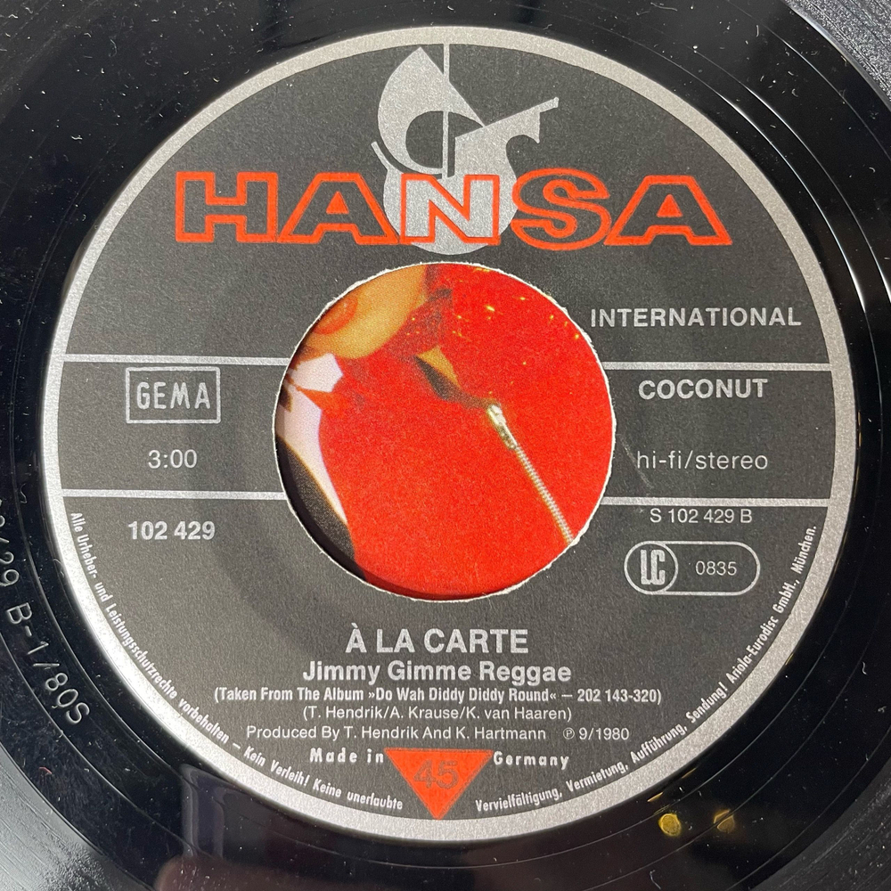 Винтажная виниловая пластинка 7 дюймов (маленькая пластинка) A La Carte Ring Me, Honey (Германия 1980)