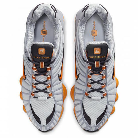 white and orange shox