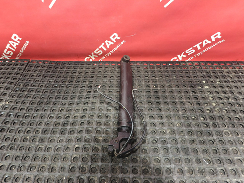 Цилиндр подъёма кабины левый