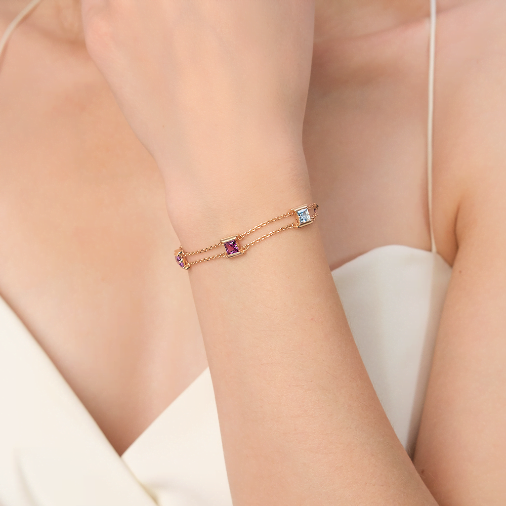 Браслет из красного золота с миксом камней