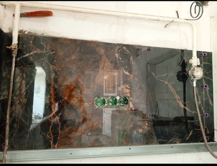 Облицовка кухонного фактука керамогранитом