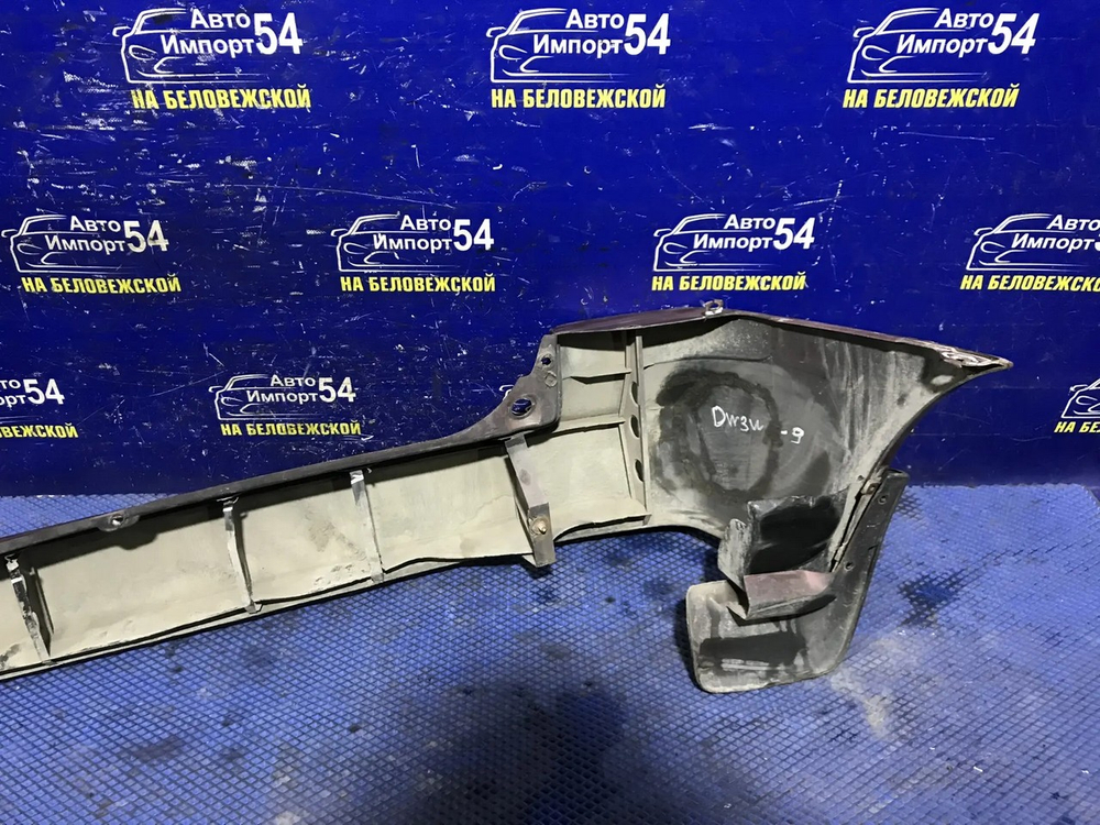 Бампер задний MAZDA DEMIO 2000