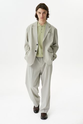 Бежево-серый брючный костюм Copper