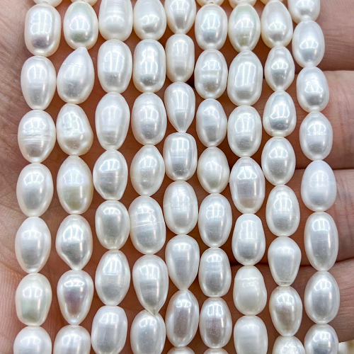 Жемчуг 3А речной бусины Рис 6-8 мм, на нитке 38 см