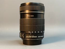 Canon EF-S 18-135mm пыль внутри передней линзы